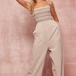 A Striped Woven Linen-blend Jumpsuit